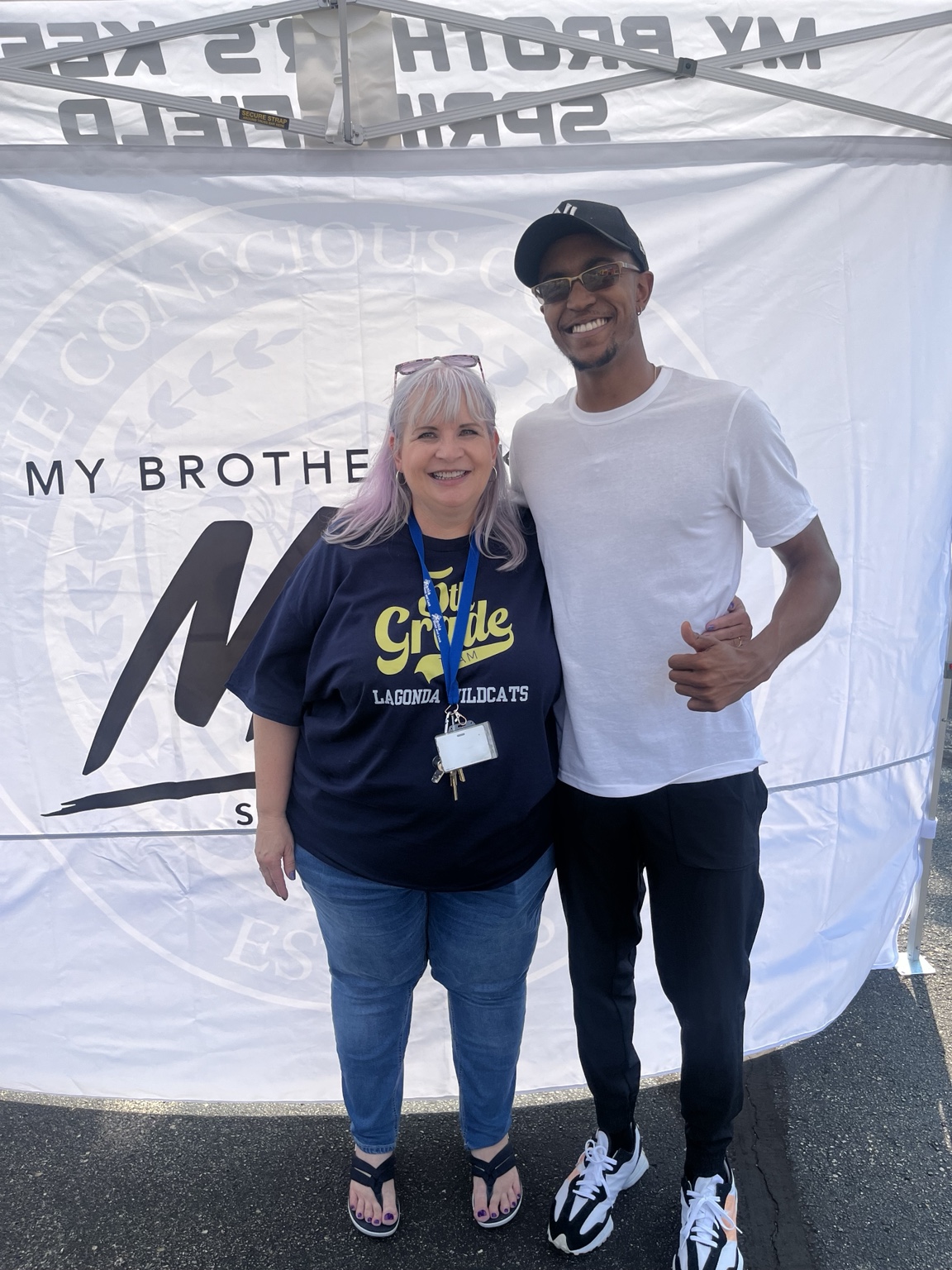 DeMarco Cannon with a community partner